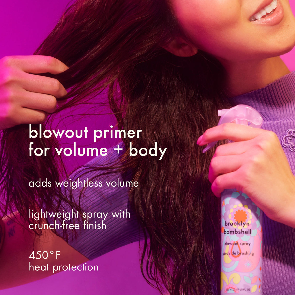 Woman applying hair spray with text about blowout primer for volume and body on a pink bac