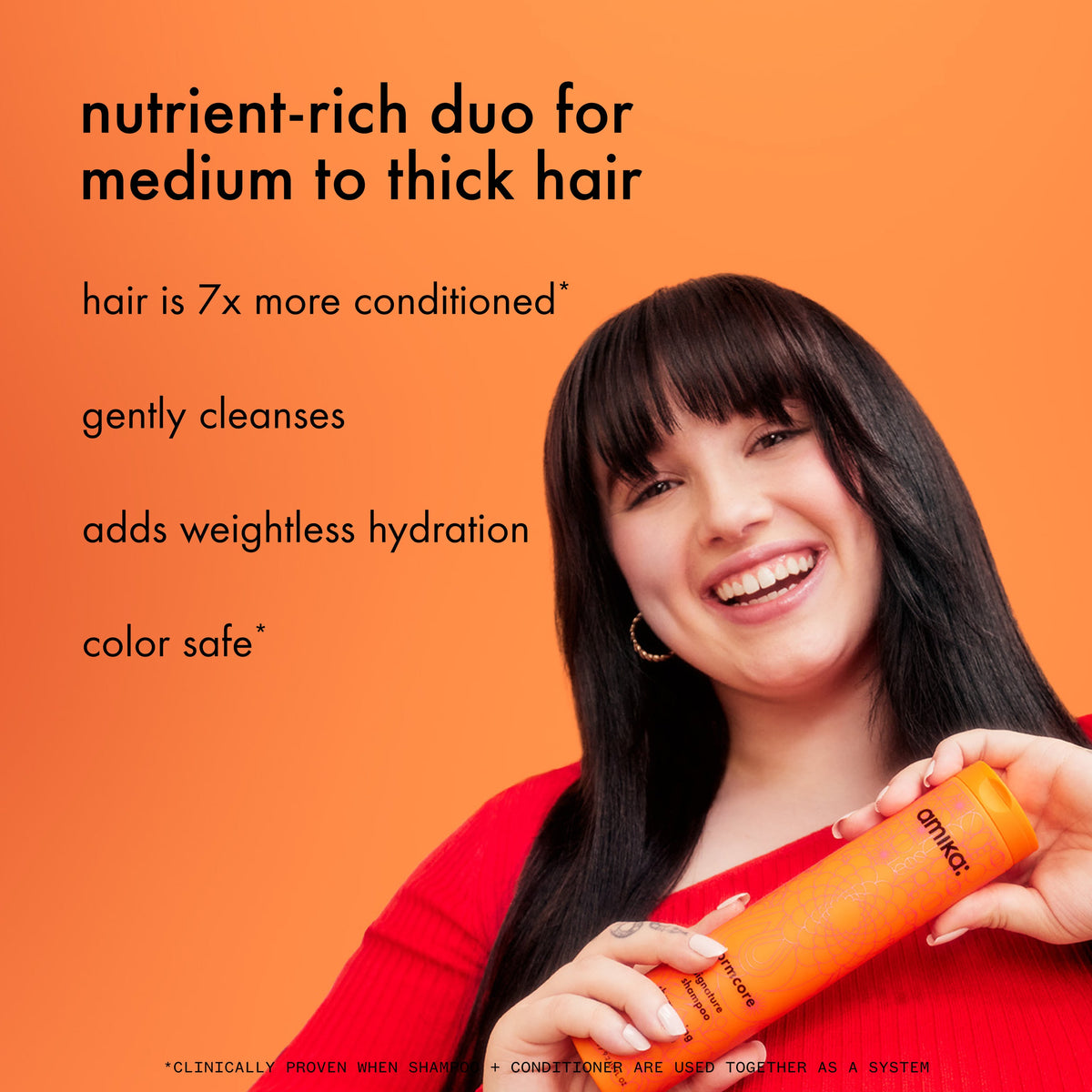 Model holds Amika normcore shampoo. text: "nutrient-rich duo for medium to thick hair. hai