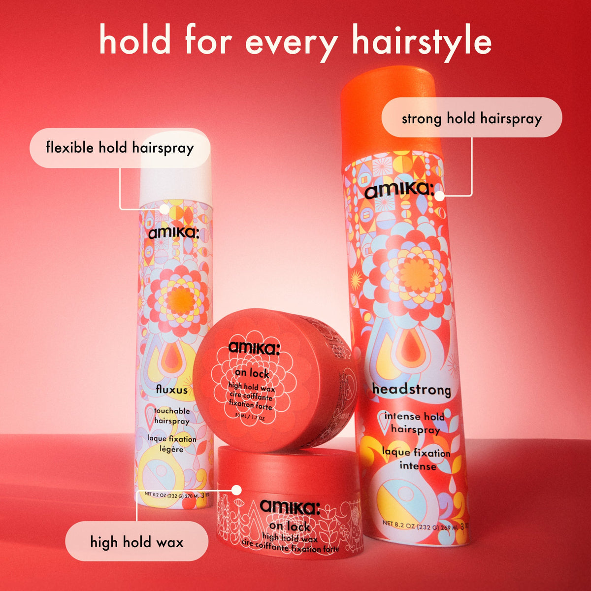 Amika hair care products including hairspray and wax on a red background