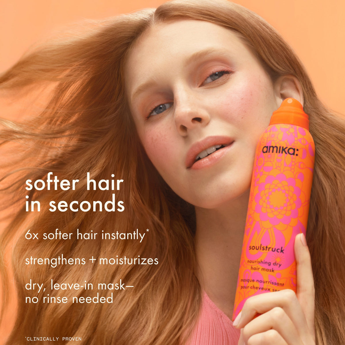 A woman with long light brown hair holds the soulstruck nourishing dry hair mask against a