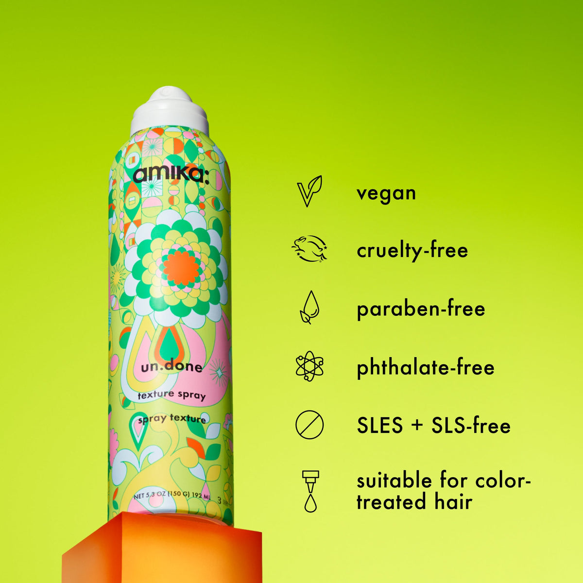 Amika texture spray can with green background and product features listed.