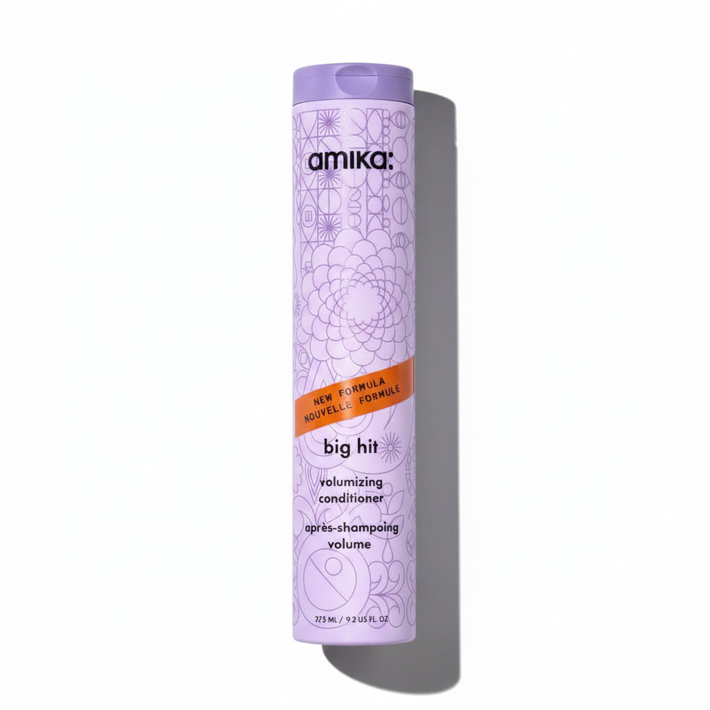 Amika Big Hit volumizing conditioner bottle on a white background