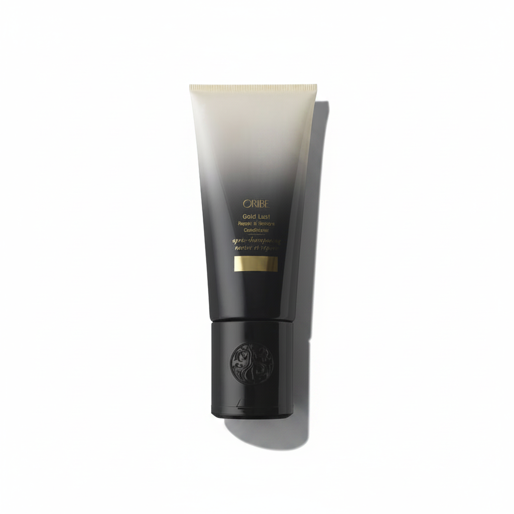 A tube of Oribe Gold Lust Repair & Restore Conditioner.