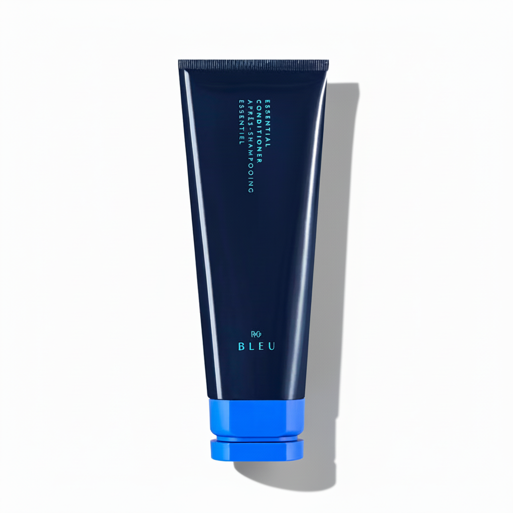 Blue tube of Régis Bleu shampoo on a white background