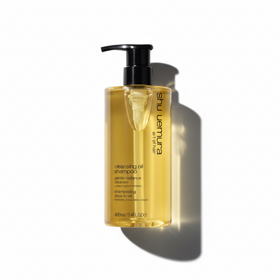 Shampoo bottle with pump on a white background