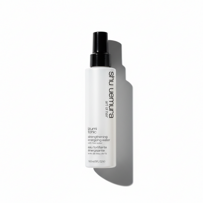 Shu Uemura bottle of toner on a white background