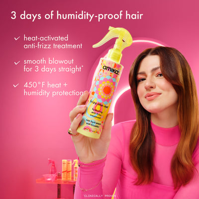Woman holding a bottle of Amika hair product with text about humidity-proof hair on a pink