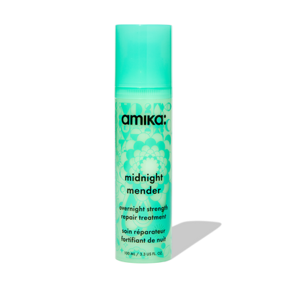 Image of a green bottle of Amika midnight mender overnight strength repair treatment mask.